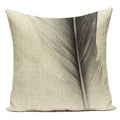Decorative pillow with a leaf pattern on a white background