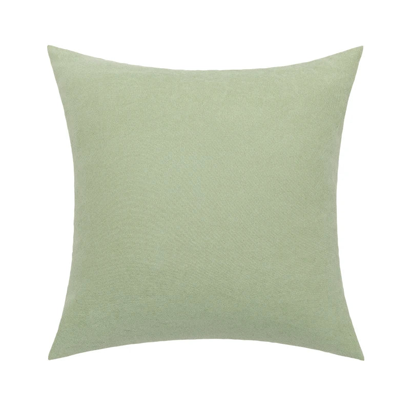 Light green linen cushion cover with minimalist solid color design