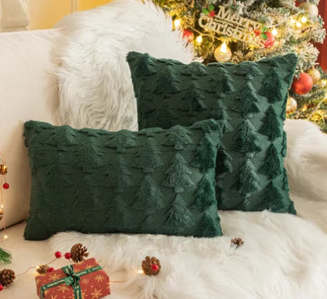 Green christmas pillow cover with snowflake and tree pattern in festive winter design