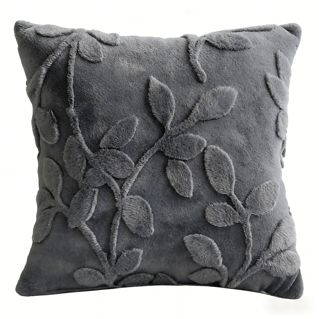 Gray pillow with leaf pattern on a white background