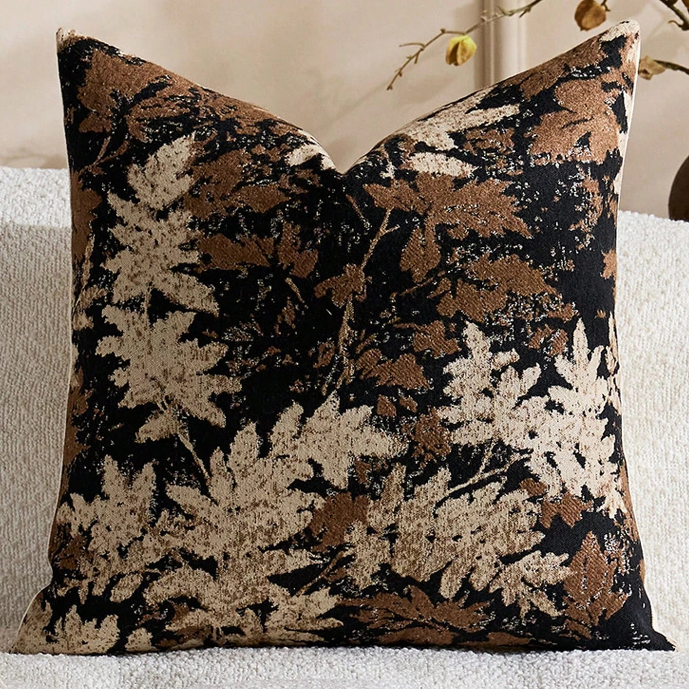 Decorative pillow with floral pattern on a neutral background