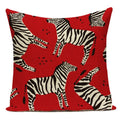 Pillow with zebra pattern on a red background
