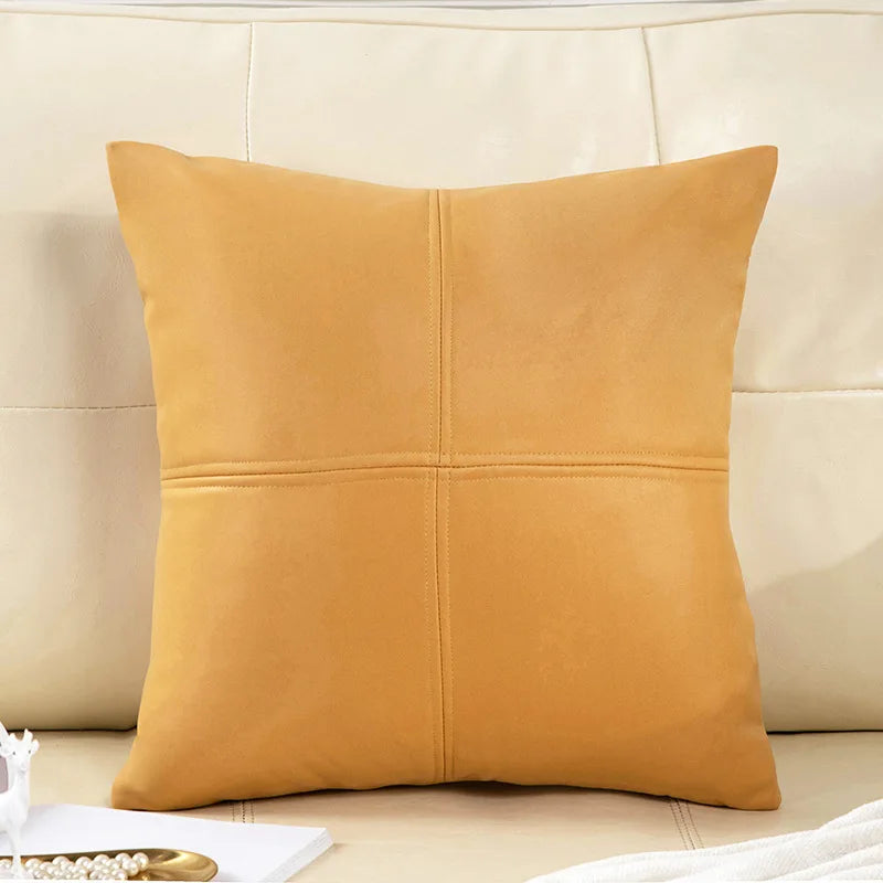 Mustard yellow pillow on a beige sofa