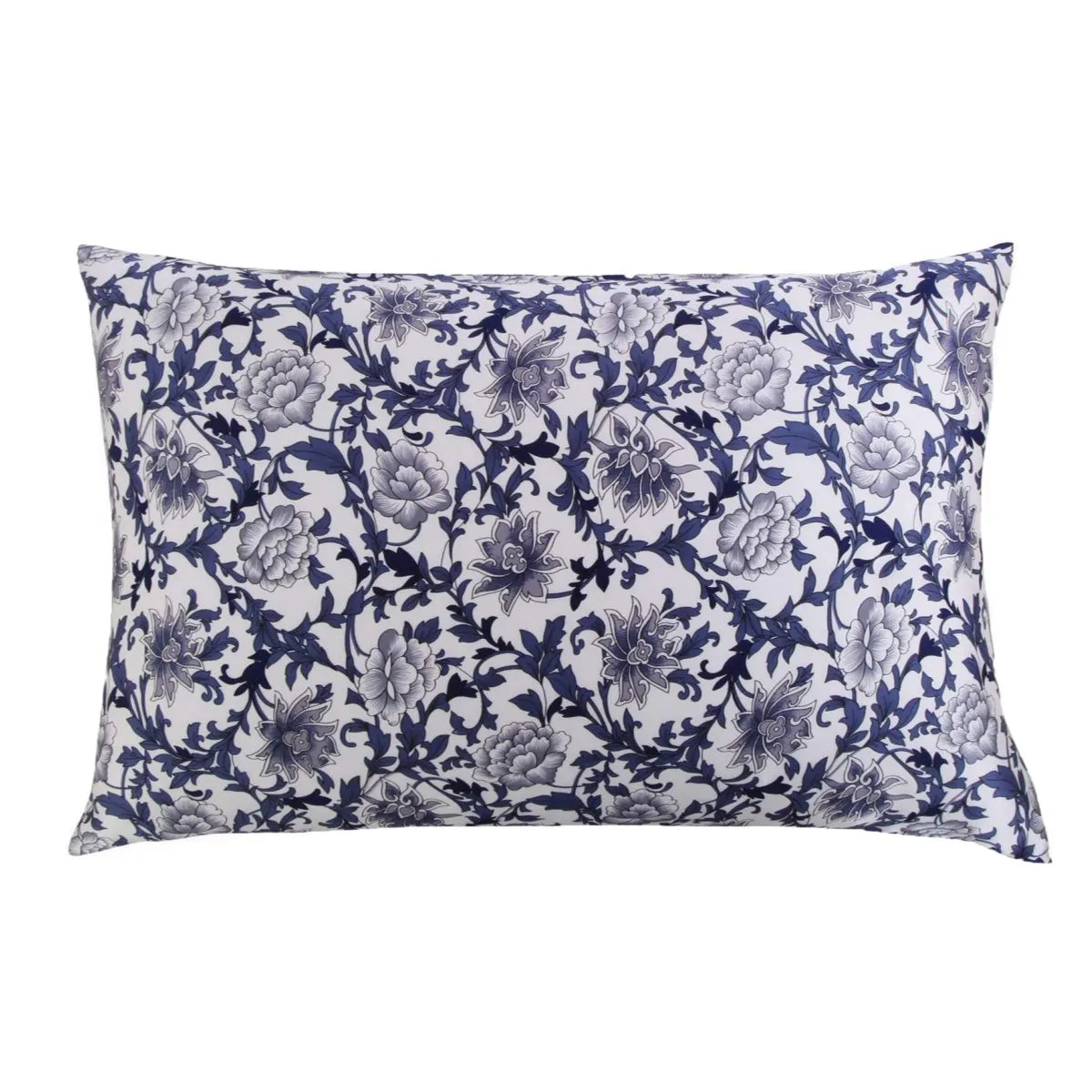 Floral patterned pillowcase with blue and white design on a white background