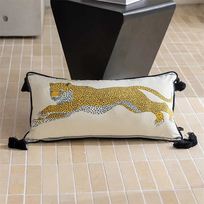Decorative pillow with a leopard design on a tiled floor