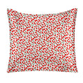 Pillow with red cherry pattern on a white background