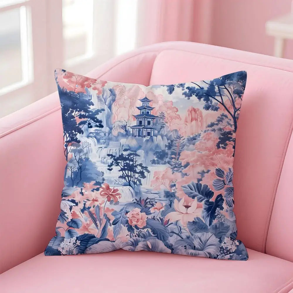 Decorative pillow with floral and architectural design on a pink couch
