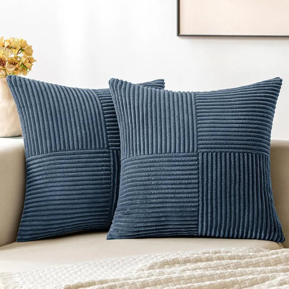 Blue corduroy pillow covers with ribbed striped texture on couch