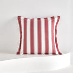 Red striped tassel pillow cover with farmhouse pattern and decorative fringe detail