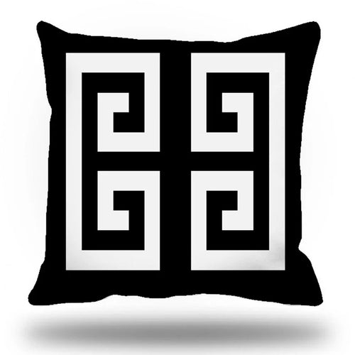 Decorative pillow with Greek key pattern on a black background