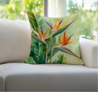 Bird of paradise tropical pillow cover with lush green leaves and vibrant floral botanical design