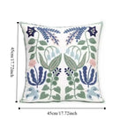 Decorative pillow with floral patterns and measurements on a white background
