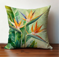 Bird of paradise tropical pillow cover with lush green leaves and vibrant floral botanical design