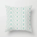 Decorative pillow with a pineapple pattern on a light gray background