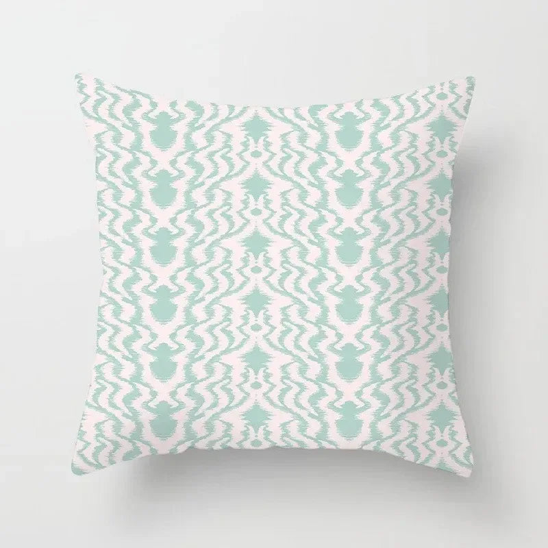 Decorative pillow with a pineapple pattern on a light gray background