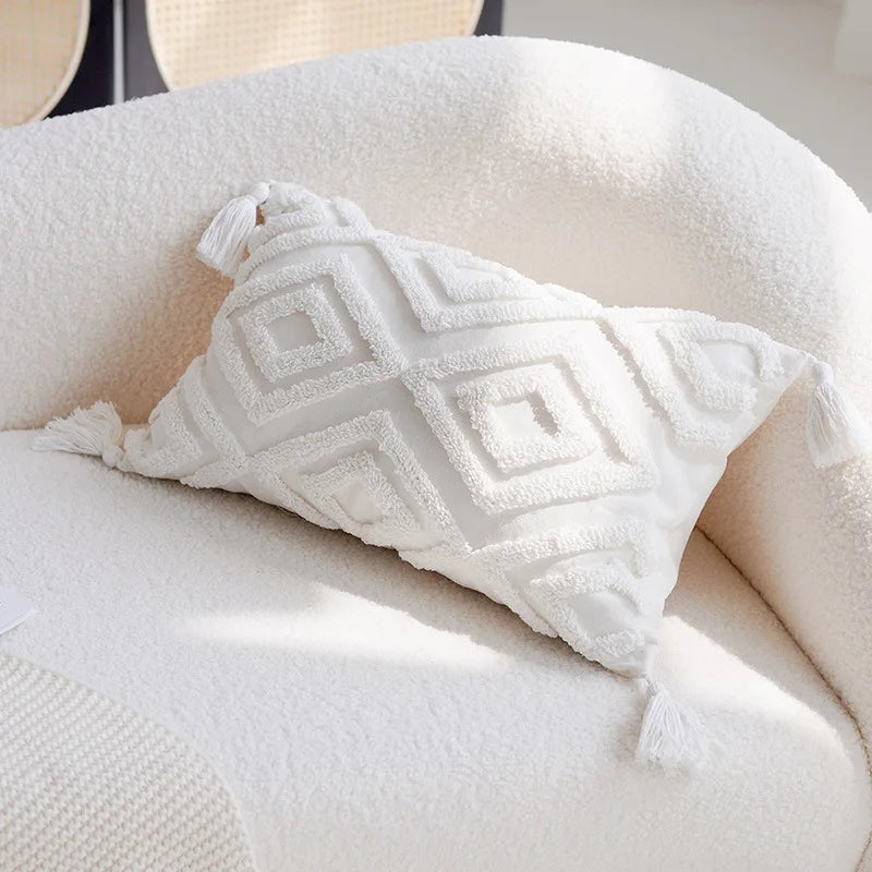 White textured pillow on a white sofa