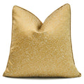 Gold glittery pillow on a white background