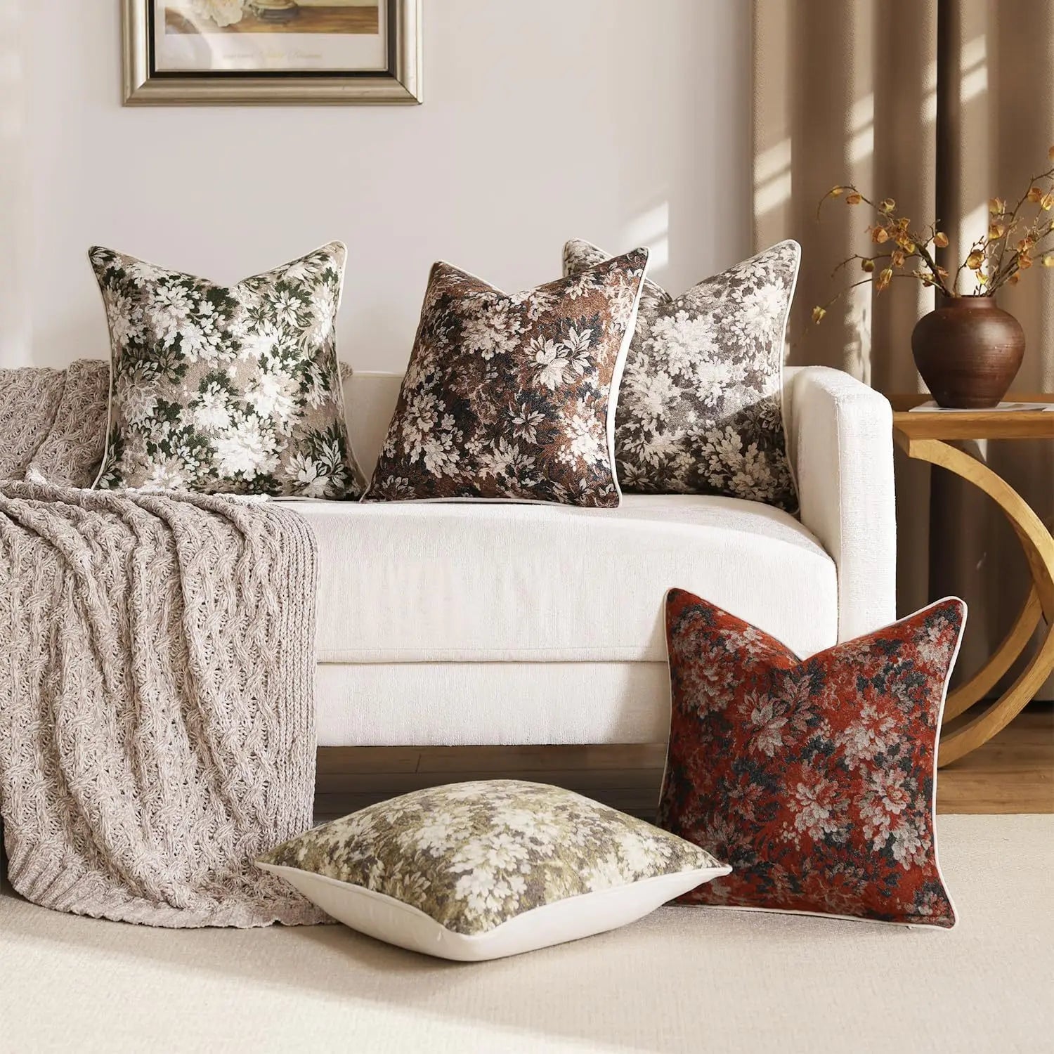Decorative pillows on a sofa with a neutral color scheme