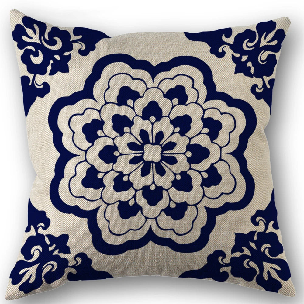 Decorative pillow with blue floral pattern on beige background