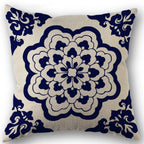 Decorative pillow with blue floral pattern on beige background
