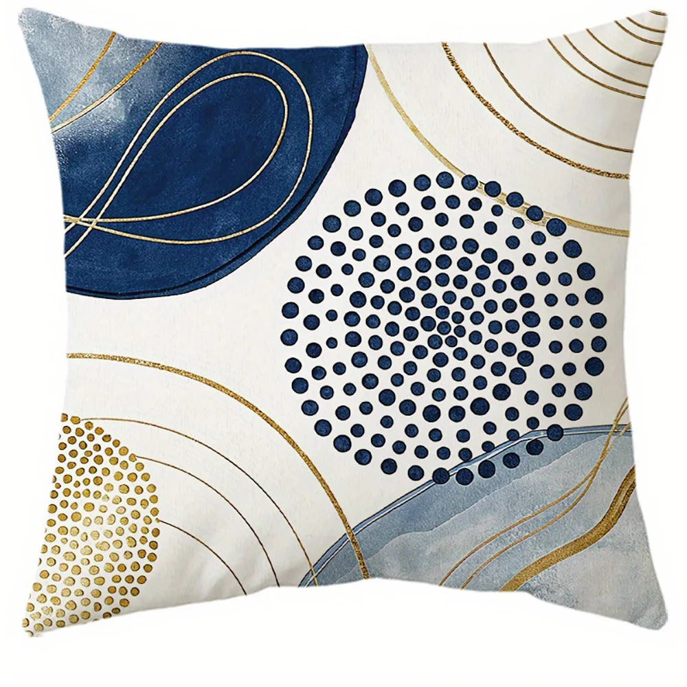 Blue decorative pillow cover with gold leaf botanical pattern on soft fabric