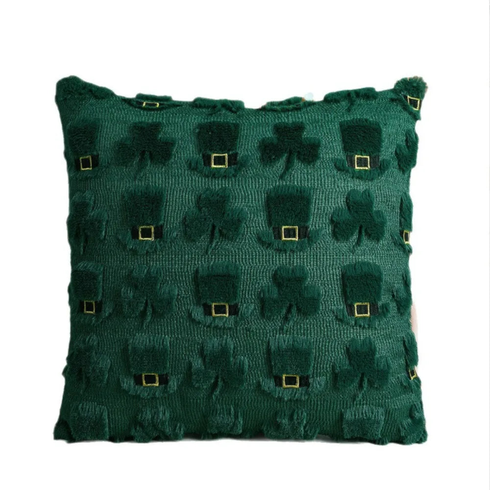 Green pillow with shamrock pattern on a white background