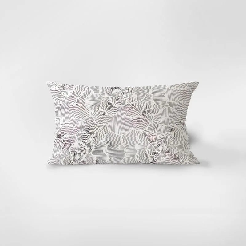 Floral patterned pillow on a white background