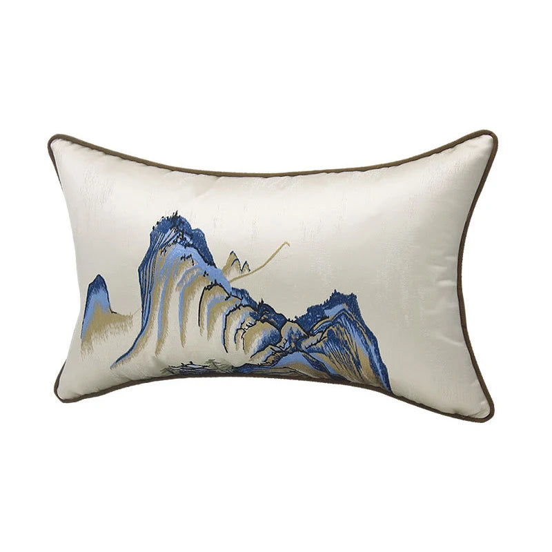 Decorative pillow with mountain design on a beige background