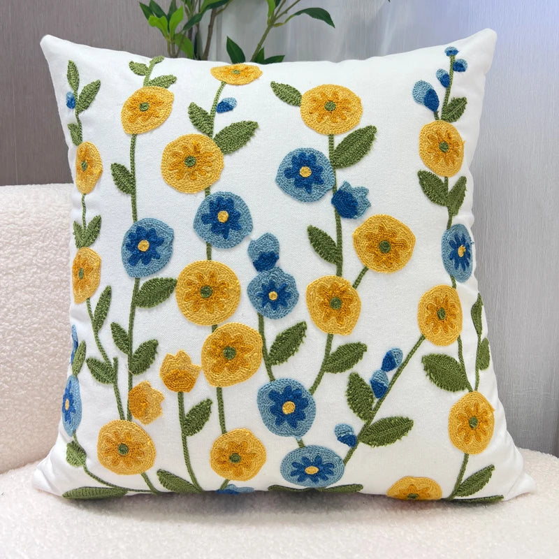 Decorative pillow with floral pattern on a neutral background