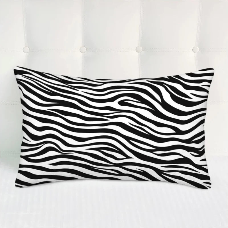 Black and white striped pillow on a white background