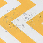 Yellow and white checkered fabric with water droplets