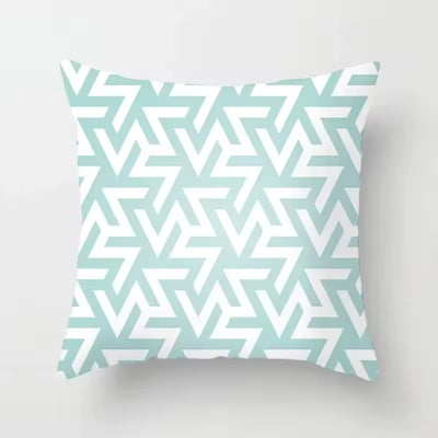 Decorative pillow with a geometric pattern on a light gray background – alternate view