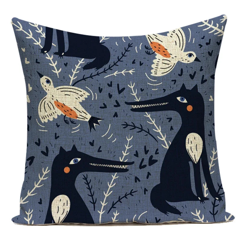Decorative pillow with wolf and bird design on a blue background