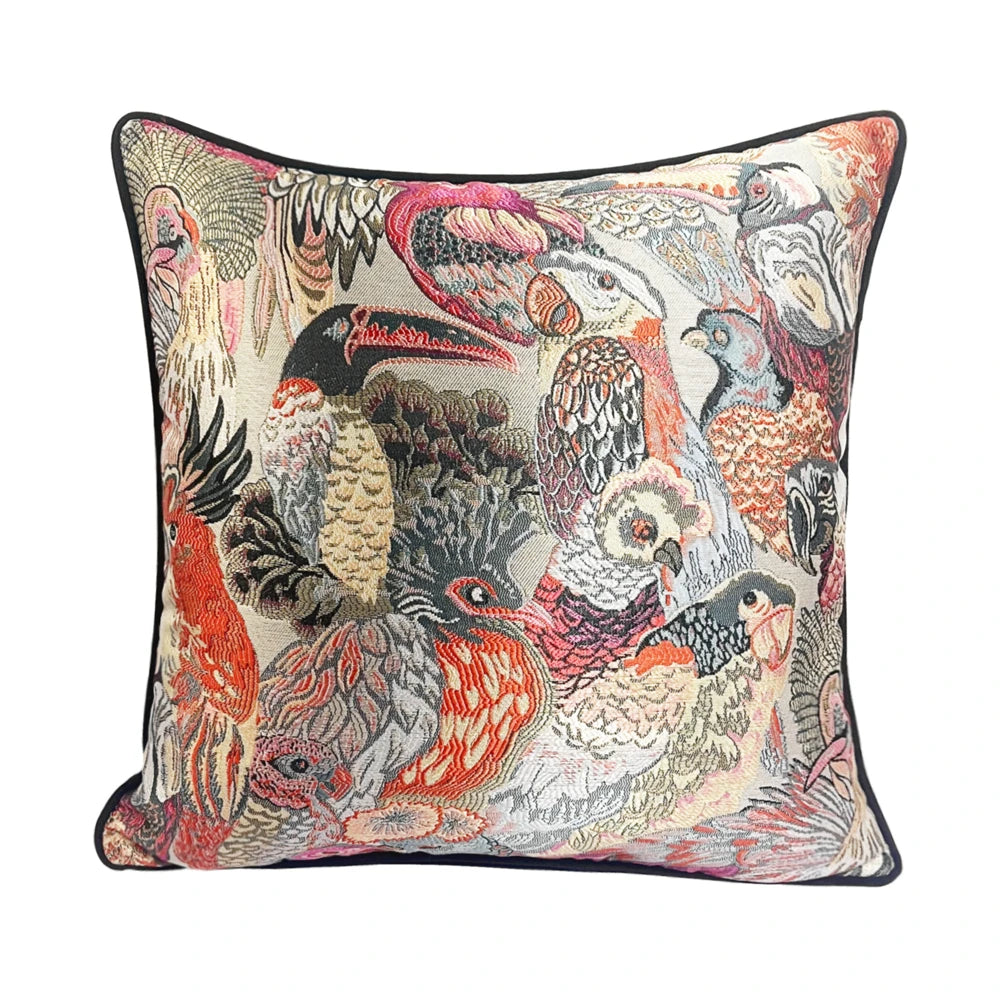 Decorative pillow with bird pattern on a white background