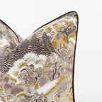 Decorative pillow with intricate floral pattern on a white background