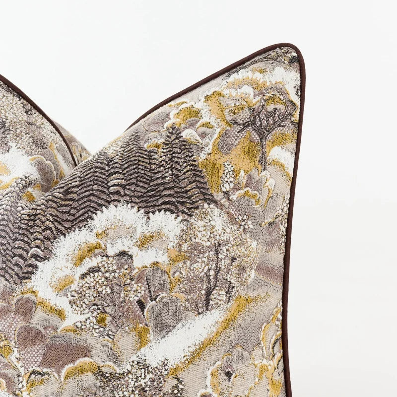 Decorative pillow with intricate floral pattern on a white background