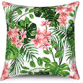 Decorative pillow with tropical floral design featuring pink flowers and green leaves on a white background.