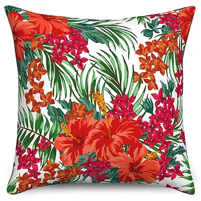 Decorative pillow with tropical floral pattern on a white background