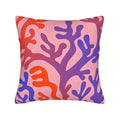 Pink coral decorative pillow cover with soft ocean-inspired pattern on plush fabric