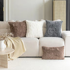 White sofa with decorative pillows in a living room setting