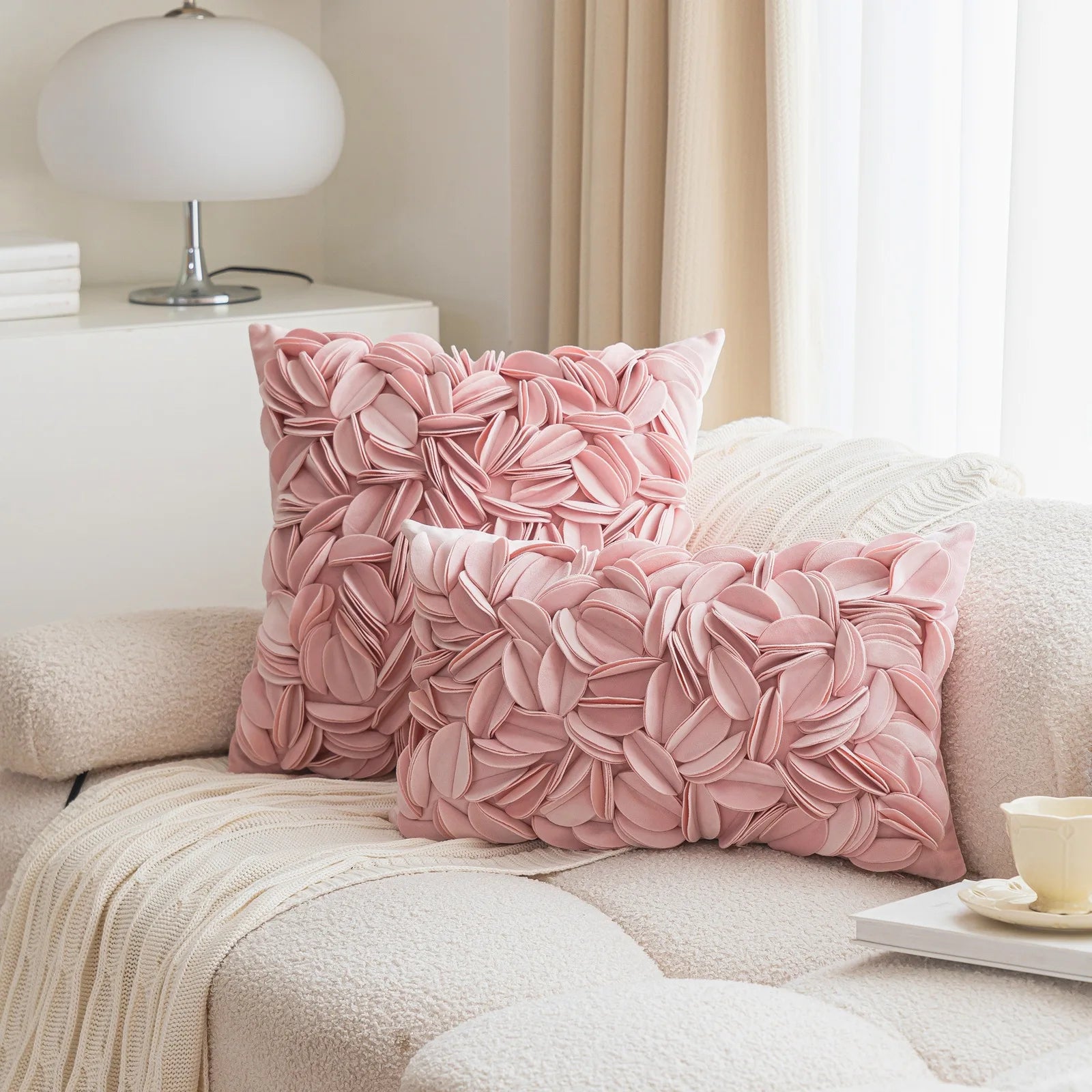 Pink luxury velvet pillow cover with floral petal embroidery and elegant textured design