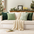 Corduroy pillow covers in green tones styled on modern living room sofa
